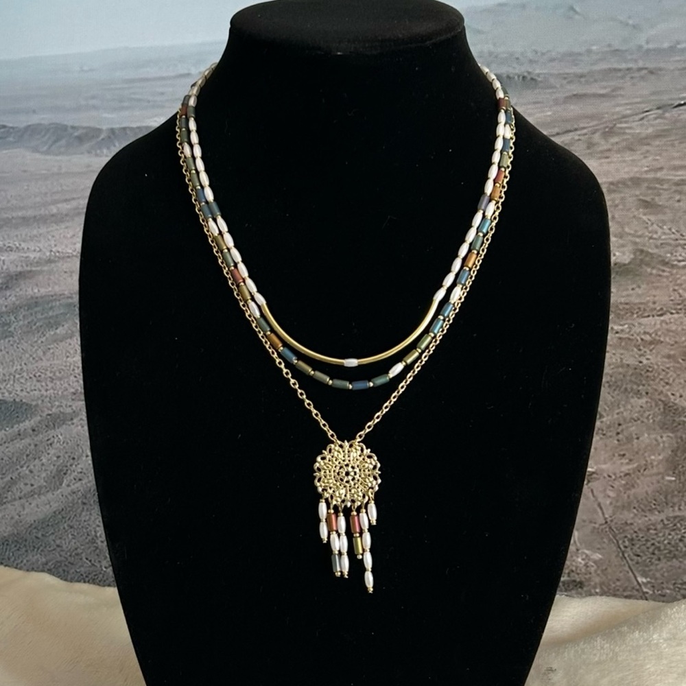Gold Layered Necklace with Pendant and Tassels